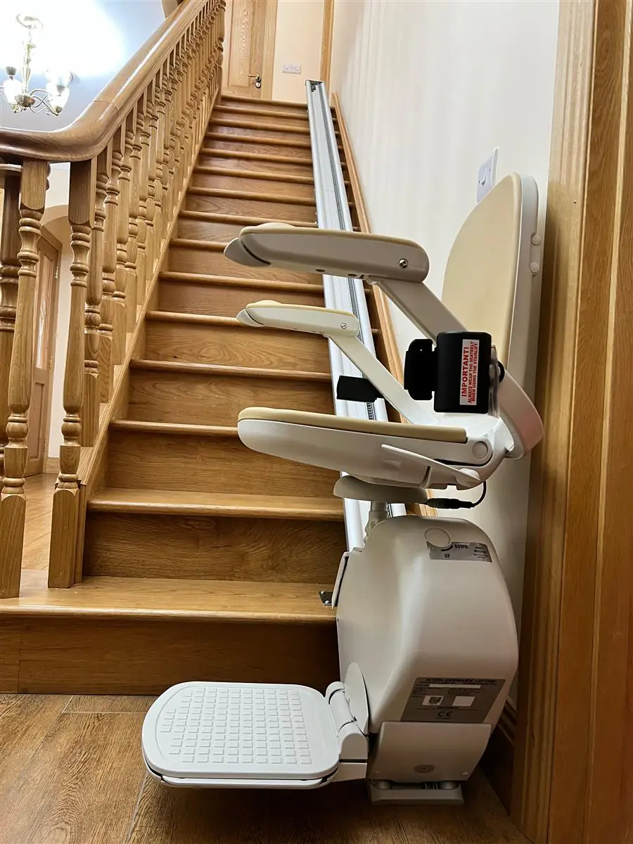 Folded stairlift chair leaving the staircase clear